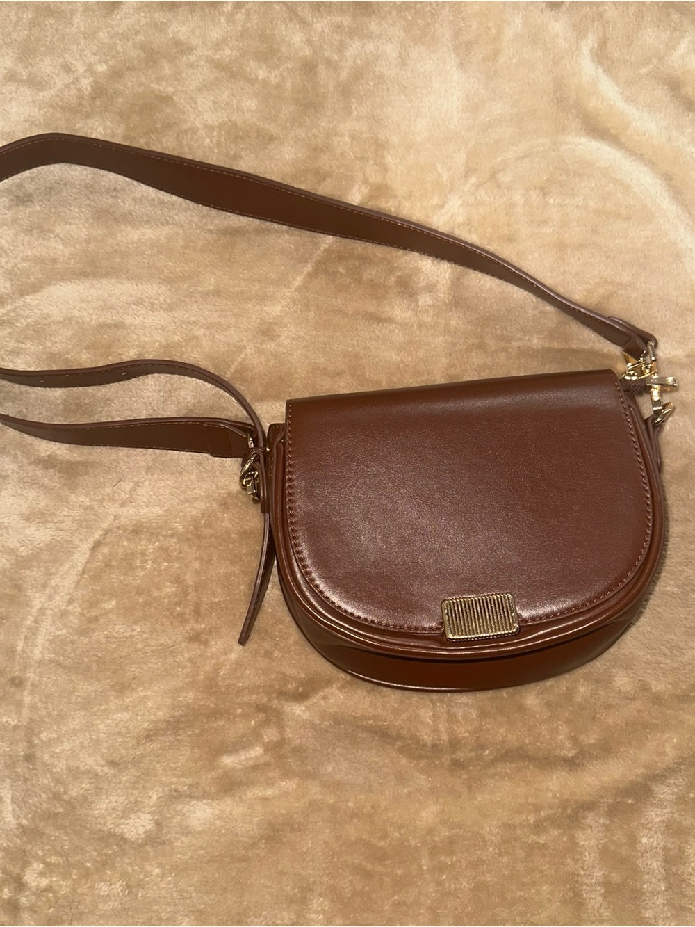 Madison West Cognac Brown Crossbody Saddle Bag with Gold Accent